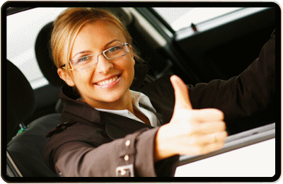 Lady in car giving thumbs up
